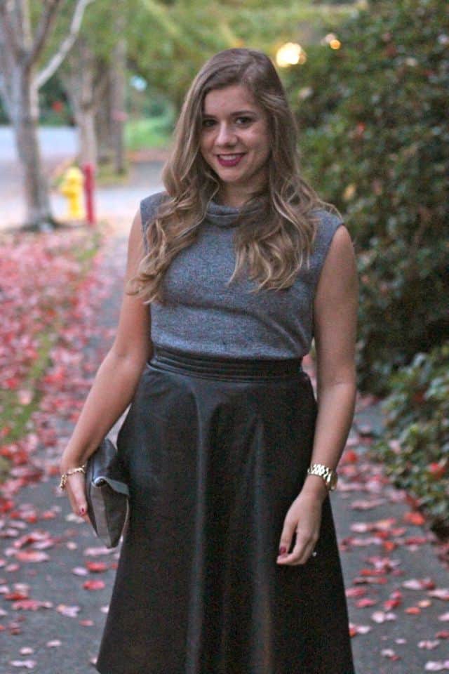 sleeveless knit top with leather skirt