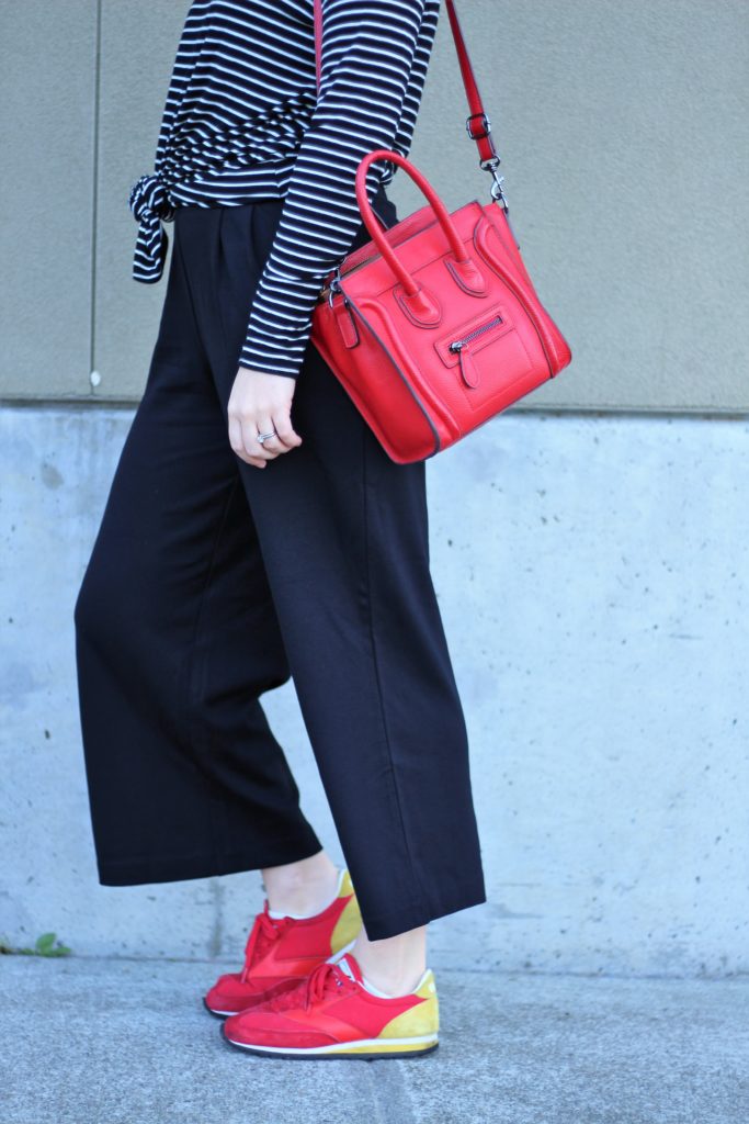 athleisure trend - why I don't wear athleisure - casual black culottes - celine luggage nano - Brooks running heritage - black white red outfit idea 2