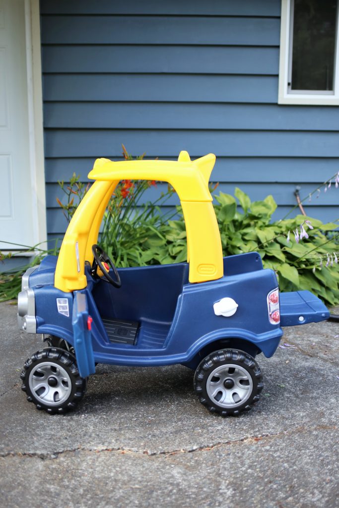 The Little Tikes Cozy Coupe Truck is a great gift for any toddler boy. This toddler pickup truck will be a backyard favorite throughout the toddler years. If you're wondering about great gifts for toddler boys, this Cozy Coupe truck is a great one for birthdays or Christmas #giftsforkids #cozycoupe #toddlertoys