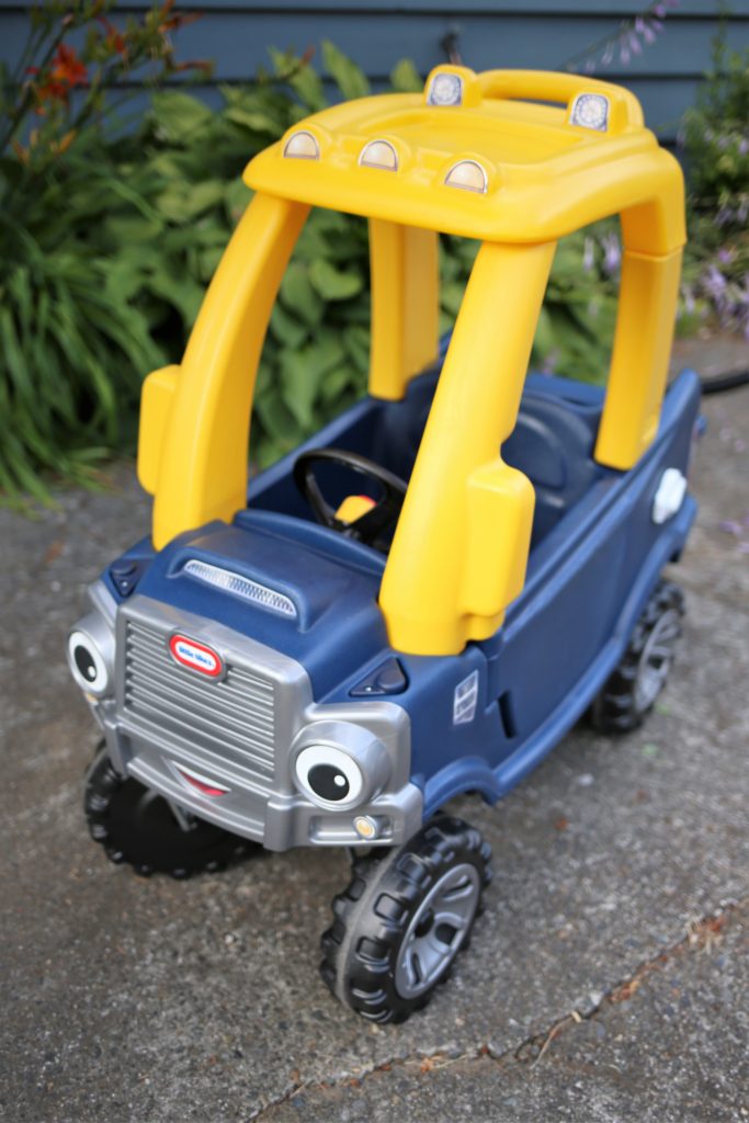 The Little Tikes Cozy Coupe Truck is a great gift for any toddler boy. This toddler pickup truck will be a backyard favorite throughout the toddler years. If you're wondering about great gifts for toddler boys, this Cozy Coupe truck is a great one for birthdays or Christmas #giftsforkids #cozycoupe #toddlertoys