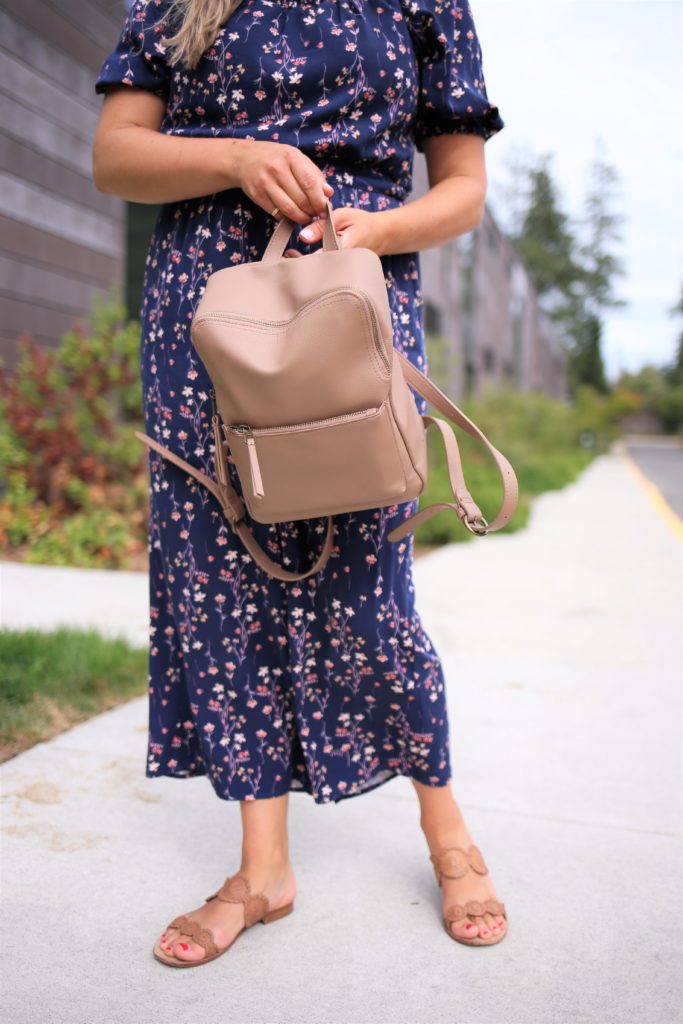 If you're looking for an affordable small backpack, this $25 backpack from Target is a great cheap option. It's the perfect size to be a toddler diaper bag without looking childish. It's actually quite stylish and minimalist as a diaper bag. I use this cheap backpack as a diaper bag for my toddler because it fits everything we need for a day out and about. #toddlerlife #toddlermom #targetstyle 