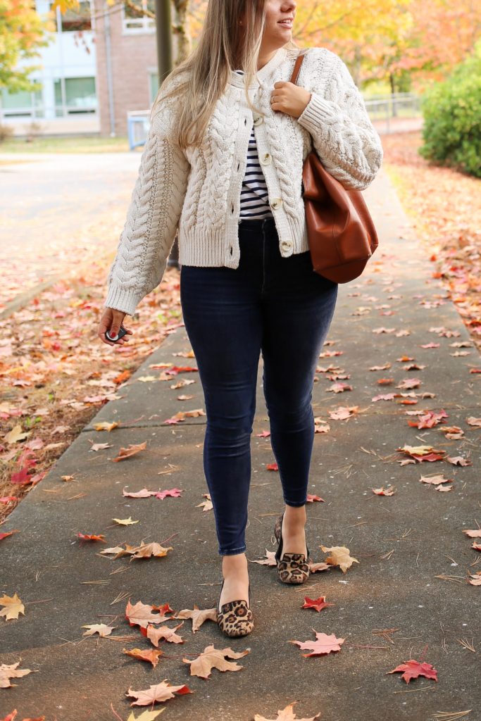 You'll love fall in this cozy fall outfit. A chunky knit sweater is ideal for when the temperature dips below 60 degrees. Get all the details of this easy fall outfit by clicking through or save if for fall outfit inspiration later #fallfashion #falloutfitidea