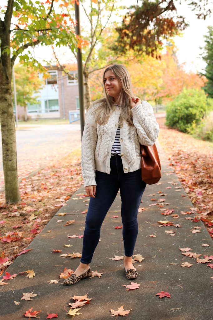 You'll love fall in this cozy fall outfit. A chunky knit sweater is ideal for when the temperature dips below 60 degrees. Get all the details of this easy fall outfit by clicking through or save if for fall outfit inspiration later #fallfashion #falloutfitidea