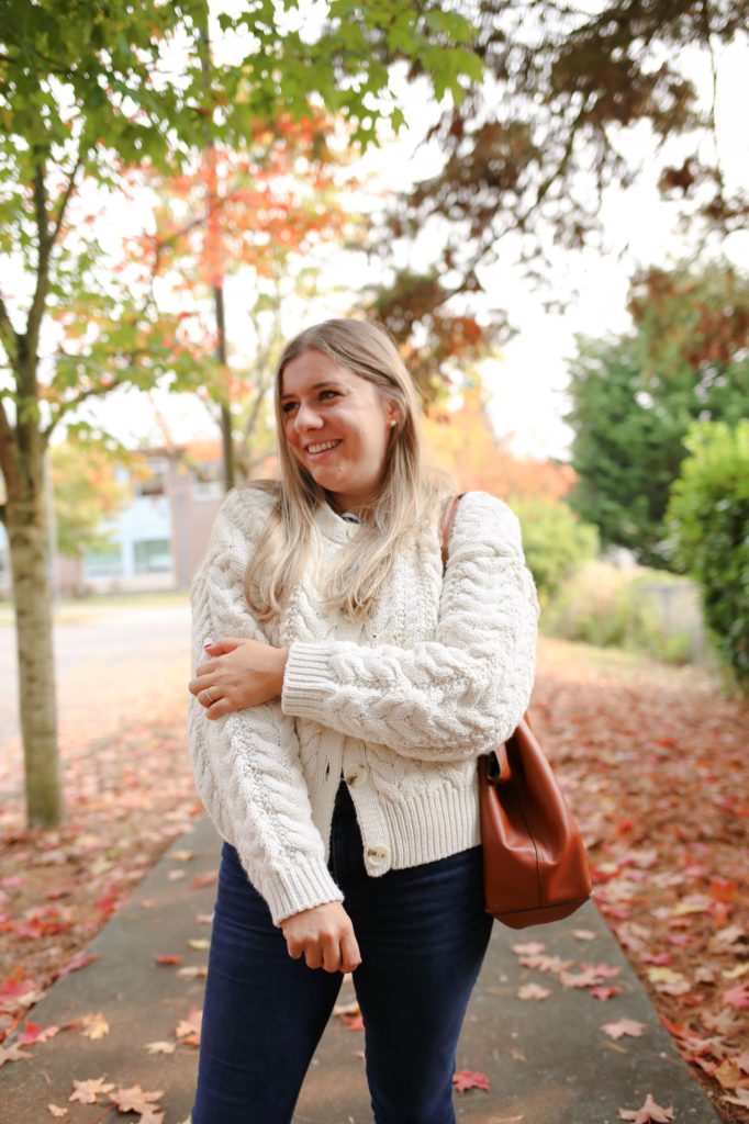 You'll love fall in this cozy fall outfit. A chunky knit sweater is ideal for when the temperature dips below 60 degrees. Get all the details of this easy fall outfit by clicking through or save if for fall outfit inspiration later #fallfashion #falloutfitidea