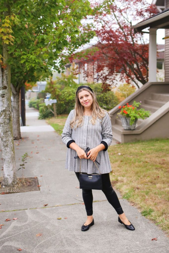 Here is a Commando faux leather leggings outfit for fall. It's a preppy fall outfit that has a little edge to it. You can also weigh in on the Spanx vs Commando faux leather leggings debate and why one is better than the other. #fallfashion #fauxleatherleggings #falloutfitidea