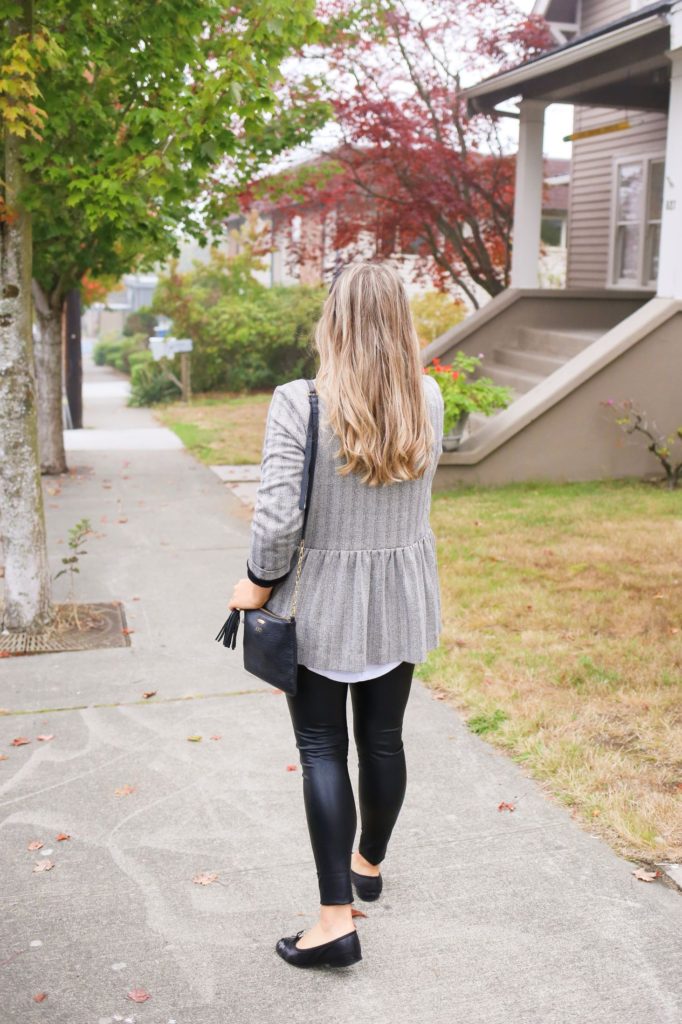 Here is a Commando faux leather leggings outfit for fall. It's a preppy fall outfit that has a little edge to it. You can also weigh in on the Spanx vs Commando faux leather leggings debate and why one is better than the other. #fallfashion #fauxleatherleggings #falloutfitidea